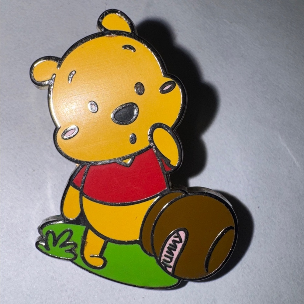 Disney Winnie the Pooh "Cuties" pin 2020 starter pin Pooh sitting next hunny pot